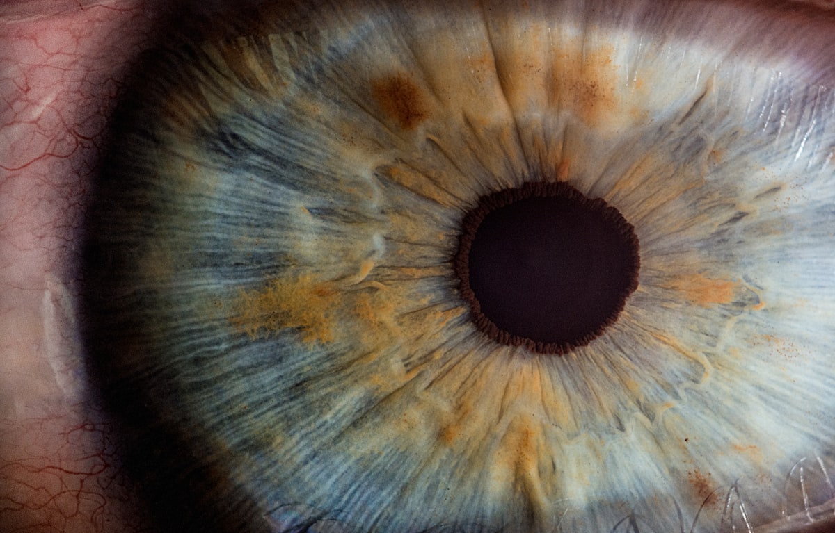 Person practicing eye exercises and outdoor activities for improved focus